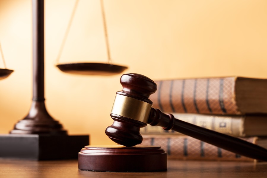 长宁刑事律师解读经济犯罪窝藏罪量刑标准